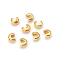 Makroaufnahme von 8 goldenen Quetschperlen-Abdeckungen für DIY-Schmuckherstellung Zubehör - Gold
