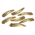 Close-up of golden metal round plate snap hair clips for DIY jewelry making accessories - 12mm / Gold