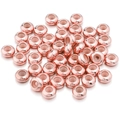 Detailed view of rose gold plated silicone stopper beads for DIY jewelry making - OD 6mm Hole 1mm / Rose Gold