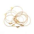 Detailed view of polished gold stainless steel hoops for DIY jewelry making and earrings - Stainless Steel Hoop / 20mm / Gold