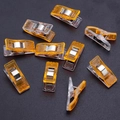 Pack of 10 orange sewing wonder clips with transparent plastic and metal spring - 2.7X1.0X1.5CM / Orange