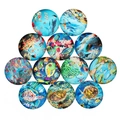 Detailed macro view of 12 circular glass cabochons with colorful sea turtle and fish patterns - 10mm / 20 Pieces Set / Ocean Life Style