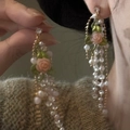 Detailed view of French vintage rose and pearl tassel earrings with pink flowers - French Vintage Rose Tassel Style / Pink and Green