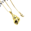 Detailed close-up of a gold-plated shell pendant with a delicate box chain and lobster clasp - Necklace Set / Gold Conch