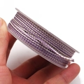 Macro view of purple and beige dragon pattern braided cord for DIY jewelry making - Purple Beige Style