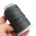 Close-up of rainbow gradient 6-ply waxed cord on spool for DIY jewelry weaving - 6-Strand / C330 (Rainbow Gradient)