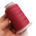 Primo piano di rotolo di filo cerato rosa scintillante per gioielli fai-da-te e bracciali - 6 fili / Rosa Scintillante (DA238)