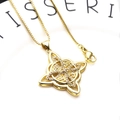 Macro detail of gold Celtic knot pendant with cubic zirconia on a box chain - Cross Celtic Knot Necklace Set (4)