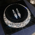 Luxurious sparkling rhinestone necklace and earrings jewelry set on black velvet - Style 15 Hollow Choker Flower