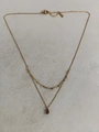 Elegant double-layered gold stainless steel necklace featuring a brown waterdrop resin pendant - Gold Necklace / Brown