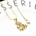 Gold dolphin and shell pendant necklace with cubic zirconia on a classic box chain - Dolphin and Shell Necklace