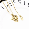 Macro detail of gold-plated starfish and sea creature charms with sparkling zircon stones - Jellyfish and Crab Necklace