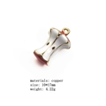 Detail of apple core pendant with dimensions 10x17mm in brass and red enamel finish - Red White Apple Core