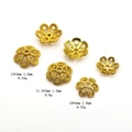 Detailed macro view of vintage gold hollow flower bead caps for DIY jewelry making - Woven Texture Style (D#12MM)