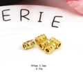 Macro view of five gold-plated alloy lotus charms with vintage engraved textures on a white tray - Vintage Carved Cylinder (B#8mm) / Gold