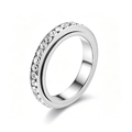 Detailed view of a silver-toned stainless steel spinner ring with full crystal inlay. - 7 / Round Style / Silver