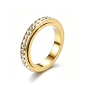Close-up of a gold-plated rotating titanium steel ring with a single row of crystals - 7 / Round Style / Gold