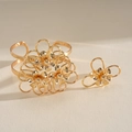 Detailed view of a gold-toned hollowed-out flower cuff bracelet and matching ring set. - Flower Bracelet and Ring Set (71#) / Gold