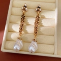 Detailed close-up of vintage golden wheatear earrings with rhinestones and baroque pearls - Earrings (HE31877HN11501) / Antique Gold