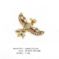 Gold bird pendant with sparkling zircons for necklaces and bracelets on white background - Spreading Wings Bird (1#)