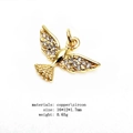 Macro shot of 16x12mm golden bird charm with zircon inlays and dimensions - Peace Dove Style (9#)