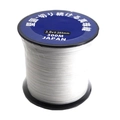 Macro shot of white 0.285mm Japanese pearl thread on spool for DIY jewelry making - 0.6# 0.128mm 300m / White