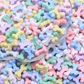 Mini resin bone-shaped beads for DIY crafts in colorful macaron shades - Bone