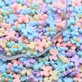 Colorful resin butterfly beads in pastel macaron shades for DIY jewelry crafting - Bow