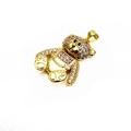 Macro detail of gold-plated bear pendant with micro-pave pink and white zircon stones - White Bear Pendant