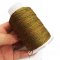 Rollo de hilo de tejer mezcla verde y bronce metalizado en carrete blanco - Mezcla Verde Bronce