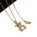Nahaufnahme der goldenen Bären-Halskette mit funkelnden Zirkonia-Mikropavé-Steinen - Stil 6 Anhänger Halskette