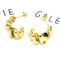 Detail of gold-plated C-shaped earrings with unique crinkle texture and glossy finish - C-Shape Pleated Texture Hoop Earrings (5)