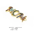 Macro detail of MOM letter connector charm with colorful micro-pave zircons and copper - Colorful Zirconia MOM Pendant (3) / 8x24mm / Gold