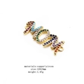Macro shot of 12*15mm MOM connector in gold plated copper with rainbow zircon stones - Colorful MOM Letters Style