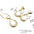 Detail view of heart shaped jewelry set with gold copper and sparkling zircons - Heart Teardrop Pendant Jewelry Set (Set 9)