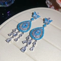 Detailed view of luxury silver drop earrings with butterfly studs and blue zircon stones - Drop Pendant Earrings