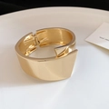 Detail of a minimalist gold geometric cuff bracelet with a smooth polished finish - 5# Bracelet-Gold