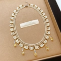 Elegant beaded lace necklace with yellow glass teardrop pendants in vintage style - Necklace-Beige