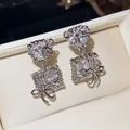 Elegant silver stud earrings featuring heart and square cubic zirconia with delicate bow motifs - Heart Bowknot Dangle (44#)