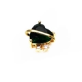 Macro detail of emerald heart pendant with gold planetary ring and white zircon stone - Heart Planet Style - Green