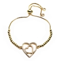 Detail of adjustable gold bracelet featuring interlocking hearts set with cubic zirconia - Double Intertwined Hearts Style (2) / Gold