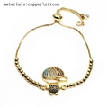 Adjustable gold bead bracelet with zircon micro-pave cartoon figure and sliding clasp - Wearing Hat Boy Style (1)