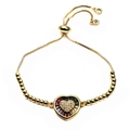 Detail of adjustable gold heart bracelet featuring rainbow baguette stones and cubic zirconia - Rainbow Border Pave Heart Style (11) / Gold