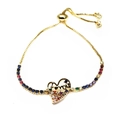 Macro detail of adjustable gold heart bracelet with rainbow zircon stones and I Love You charm - I Love You Rainbow Heart Style (13) / Gold