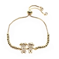 Detail of gold adjustable box chain bracelet with micro-pave boy and girl charms - Couple Holding Hands Style (5)