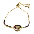Detail of adjustable gold bracelet with micro-pave rainbow crystals and heart charm - Heart White Zircon Rainbow Border Style (16) / Gold