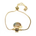 Detail of adjustable gold box chain bracelet with micro-pave boy pendant and zircon drops - Colorful Hat Boy Style (9)