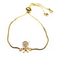 Detail of adjustable box chain bracelet featuring a zircon-inlaid boy charm in gold finish - Sunny Boy Style (15)