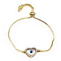Macro detail of adjustable gold slider bracelet with pavé zircon heart and evil eye charm - Heart Blue Eye Style (22)