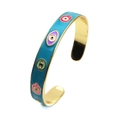 Bohemian evil eye and hamsa hand open cuff bangle in gold plated finish with blue enamel - Lake Blue